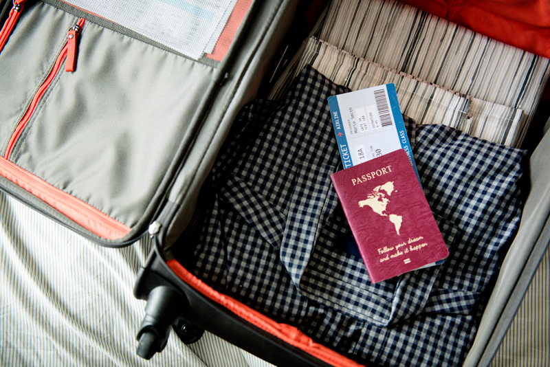 Traveling Luggage and Passport